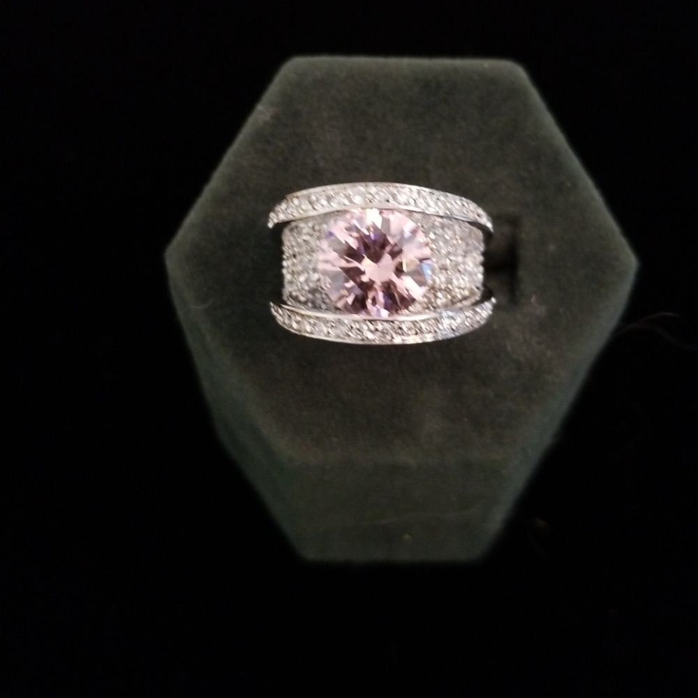 New sterling silver ring with pink center stone